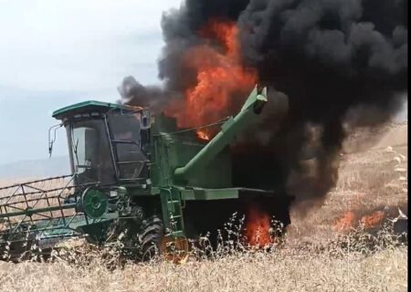 آتش سوزی در مزارع کشاورزی لالی/یک دستگاه کمباین در آتش سوخت + فیلم و عکس